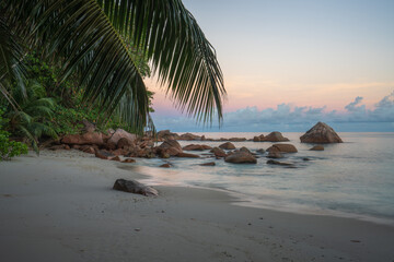 Fototapeta na wymiar sunrise at tropical beach anse lazio on praslin on the seychelles