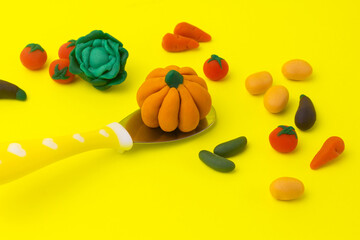Organic vegetables for baby healthy diet. Play dough cute food creative image concept