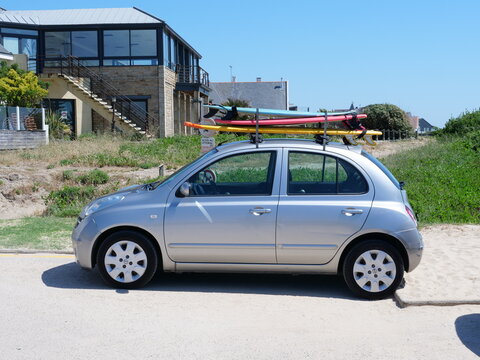 A Car With Some Surfboards On Its Top. June 2021, France.