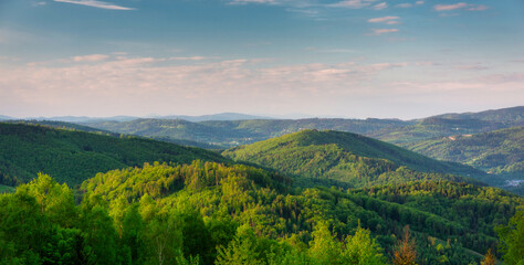 Scenery of the Silesian Beskids from Rownica peak at sunrise. Poland
