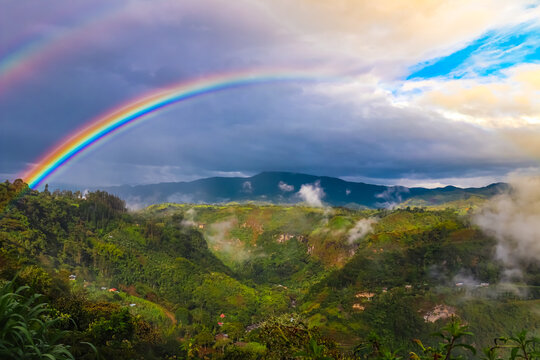 Colombian landscape with a rainbow