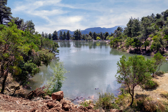 Panoramic view to Beletsi Lake and the beautiful nature that surrounds the lake. It is located at an altitude of 600 meters on Parnes mountain in Athens, Greece