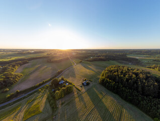 Beautiful aerial panoramic photo of Lithuania country side during summer sunset.