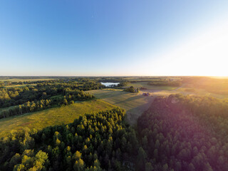 Beautiful aerial panoramic photo of Lithuania country side during summer sunset.