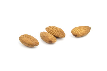 Almond nuts isolated on white background. Heap of scattered almonds