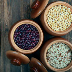 Beans, rice and peas in ceramic bowls. Natural healthy food concept.