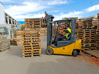 Paterna, Valencia, Spain: 10.21.2020  The warehouse of vegetables and forklift © Oksana