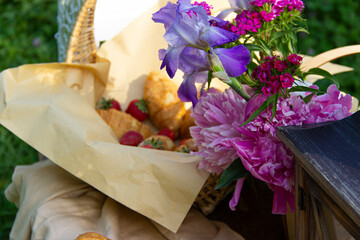 Croissant,strawberries,beautiful flowers,morning breakfast.