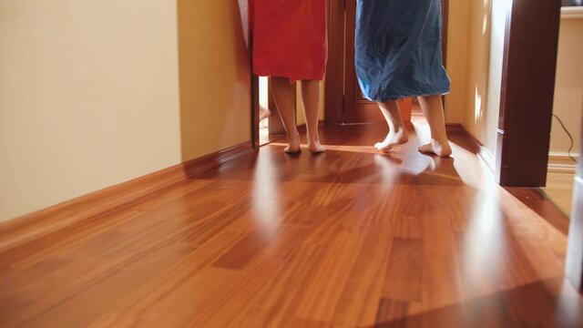 Big family racing towards free toilet or bathroom at morning in house. Concept of family living in big house or on vacation