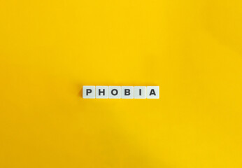 Phobia banner and concept. Block letters on bright orange background. Minimal aesthetics.