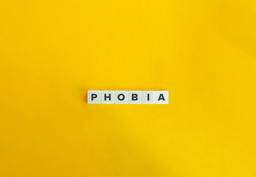 Phobia banner and concept. Block letters on bright orange background. Minimal aesthetics.