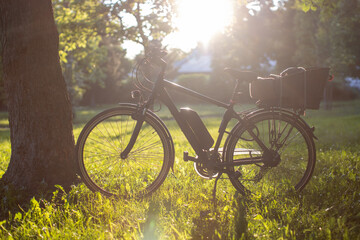 electric bicycle silhouette on a bright sunny day