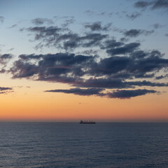 Fototapeta na wymiar Sunset in the North Sea from on board a cruise ship