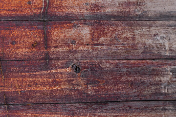 Obraz premium Dark brown wooden cutting board. Wood texture background. Top view