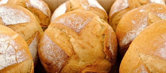 Home-made bread, close view of many small loafs.