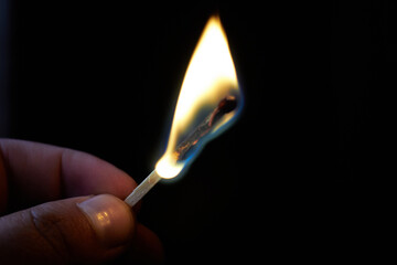Burning flame from a match stick