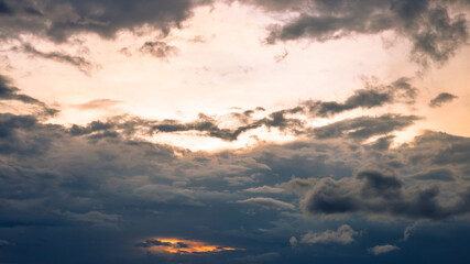 Highly blurred background from the residence,with a panoramic view of the city(condominium,office,home offices,houses,football fields,bridges across the river) and colorful colors from the evening sky