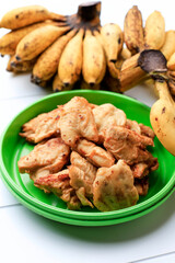 Banana Fritter or  Pisang Goreng, Traditional Indonesian Dish Made from Banana with Flour Batter Coating and Deep Fried. Selected Focus