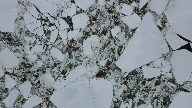 an ice drift on Enisey river. Dudinka city, Taimyr, Siberia