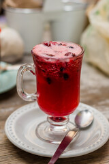 Fresh blackberry explosion on cafe table.
