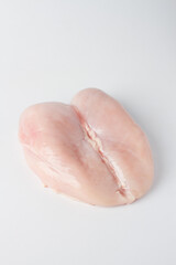 Raw chicken breast, flat lay, white background