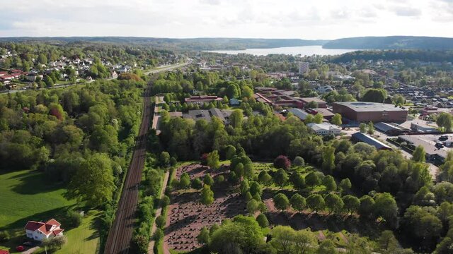 Aerial View Of Picturesque Houses of Lerum, Vastra Gotaland,Sweden. Aerial footage over Lerum,Sweden. Showing some beautiful houses with a view over the city and green landscape and river at a distant