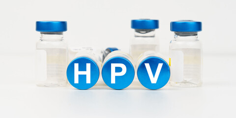 On the blue roofs of the injections it says - HPV