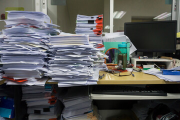 Busy, messy and cluttered workplace, full of documents - obrazy, fototapety, plakaty