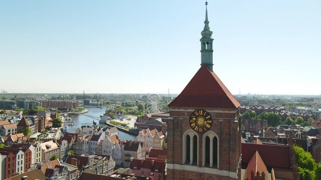 Aerial View Of St Bridget Church In Old Town Gdansk In Poland During Daytime - drone shot