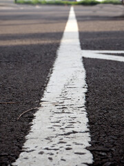 sign and line on tarmac