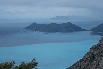 The islands float in the azure waters of the Mediterranean Sea.