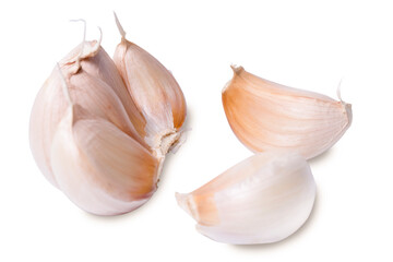 Fresh garlic  cloves with garlic peel isolated on white background