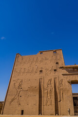 Vertical shot of the entrance to the Temple of Edfu (Horus Temple) in Edfu, Egypt
