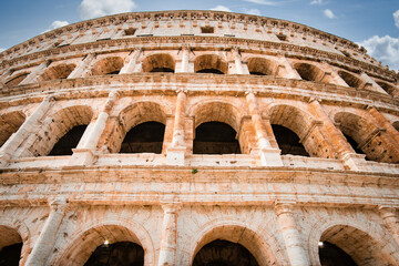 Obraz premium Colosseum in Rome. travel directions and rest in Italy. Europe sightseeing landmarks and tourism