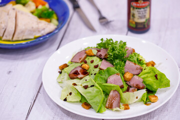 Smoked duck breast fresh vegetable salad.