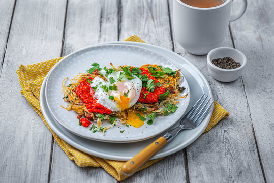 Potato rosti with chorizo, coriander, red pepper dip and poached egg