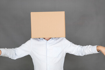 No idea business man wearing a cardboard box