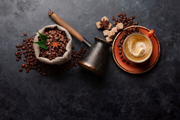 Roasted coffee beans, Turkish jezve, coffee cup and sugar
