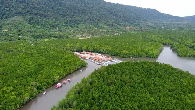 Aerial drone view of Kubang Badak jetty complex in mangrove park Langkawi
