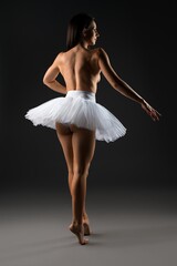 Sexy ballerina in tutu skirt in studio