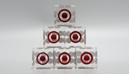 Six dice stacked on top of each other. One point facing forward on a white background.