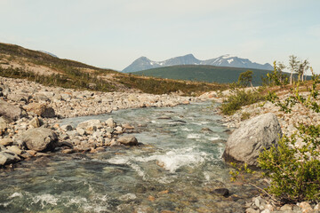 Fototapeta na wymiar Small River Running from Blåvatnet