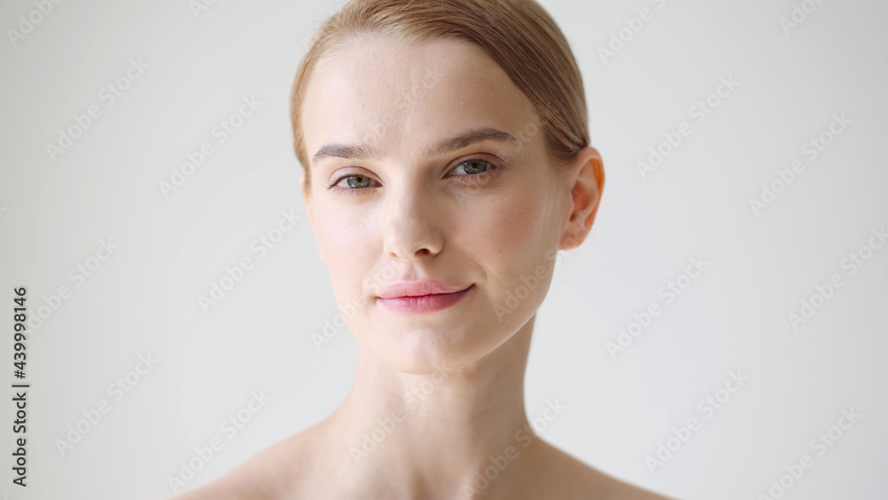 Wall mural beautiful woman healthy skin natural make up close up face beauty blonde short hair