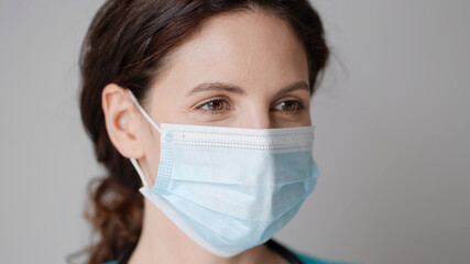Doctor woman nurse medical masc close up in hospital portrait