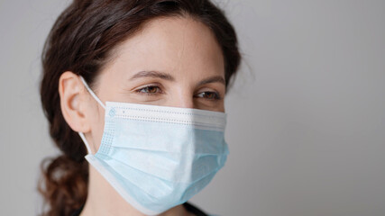 Doctor woman nurse medical masc close up in hospital portrait