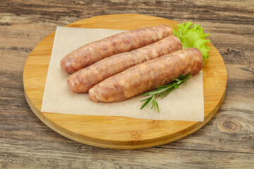 Raw pork meat sausages for grill