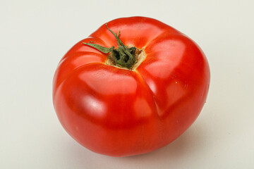 Ripe big juicy red tomato