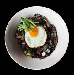 traditional Jajangmyeon or jjajangmyeon is a Korean noddle topped with black gravy sauce