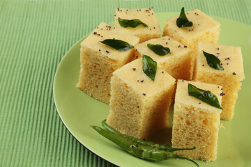 Gujarati Khaman Dhokla made using Chana Dal, served with Green chutney