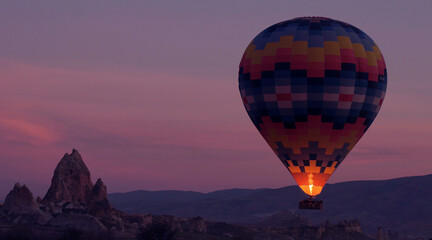 Sunset hot air balloon ride scene. Hot air balloon basket sunset silhouette.